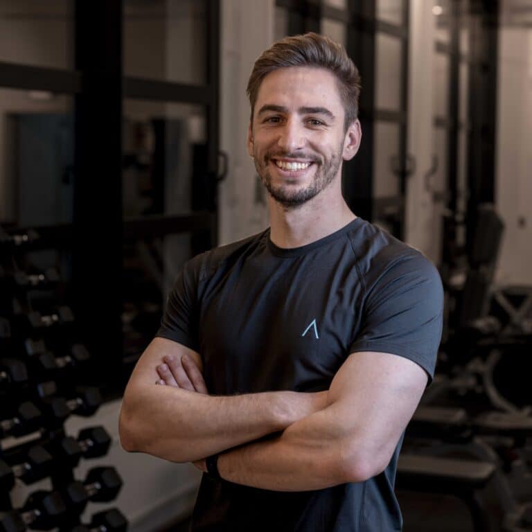 Portrait photo of physiotherapist Dennis in exercise area
