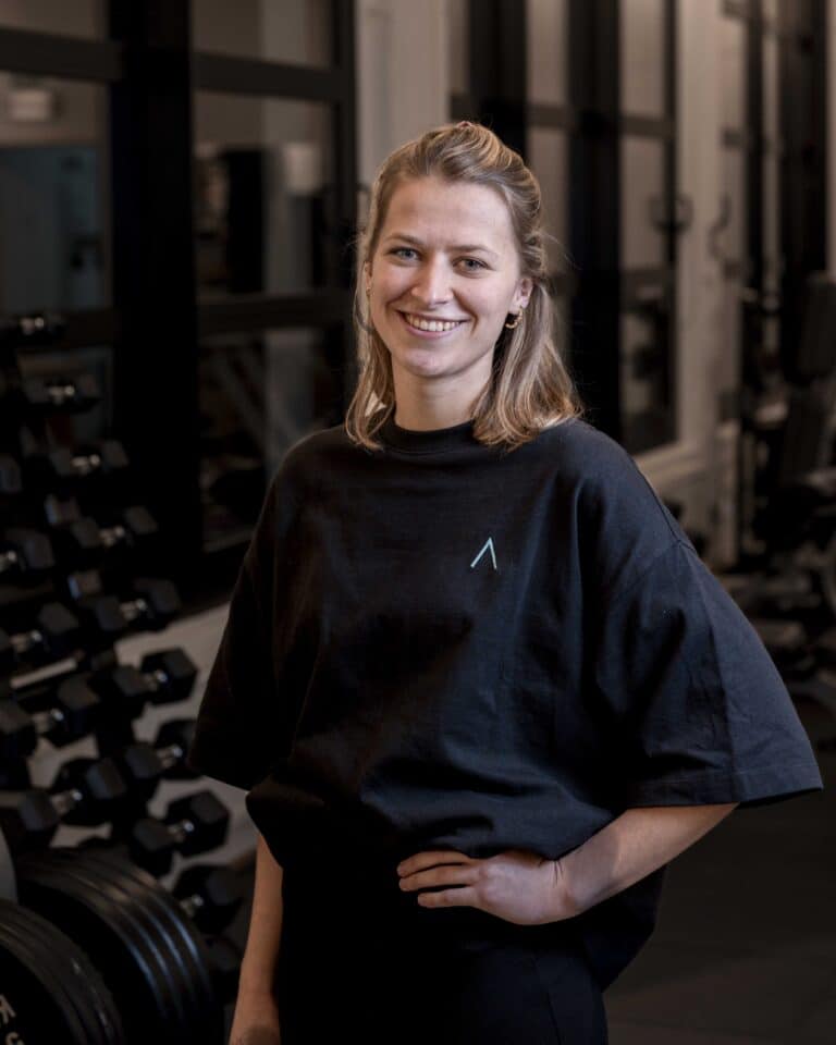 Portrait of sports physiotherapist Laure Detré at Peak Physio Antwerp